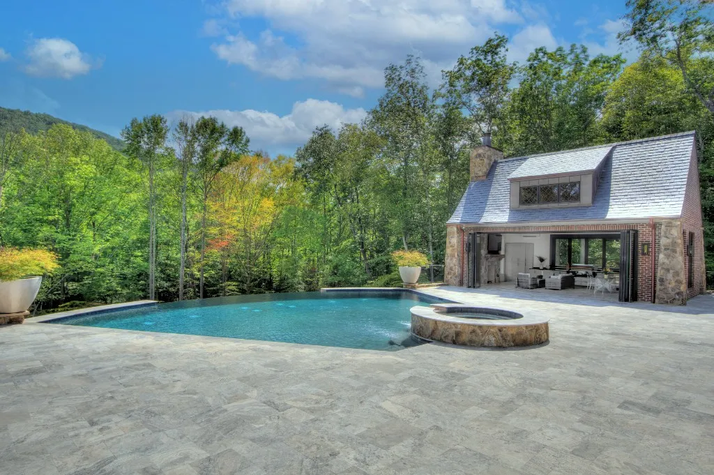 Mtn Lake — infinity pool and pool house at the forest edge