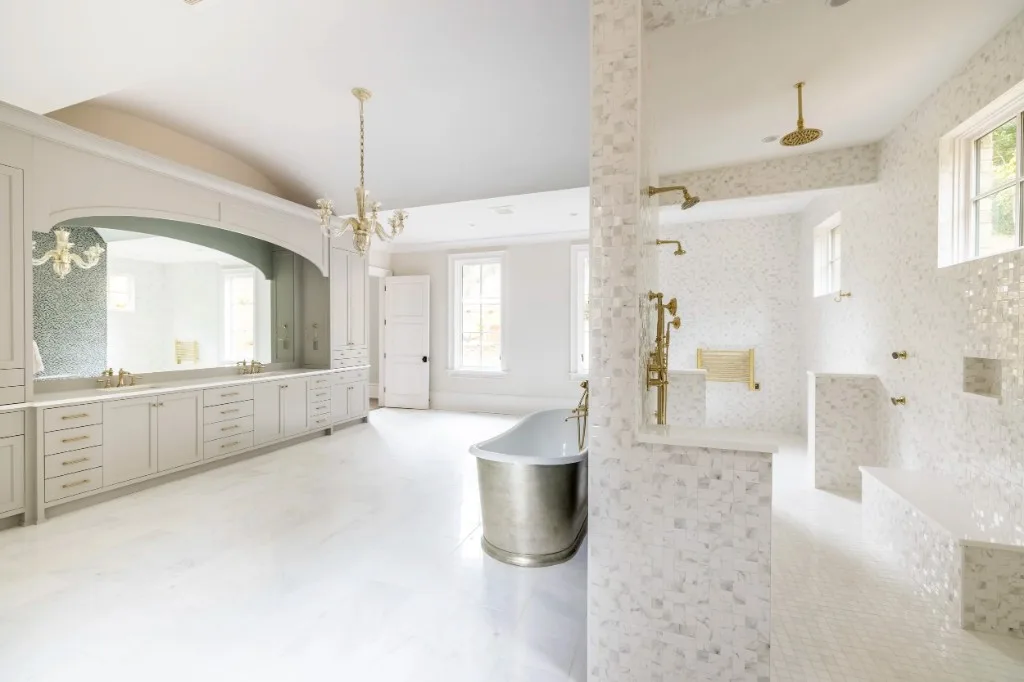 Paces Ferry Estate — primary bath with metal soaking tub and marble mosaic shower