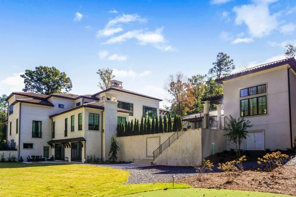 Peachtree Rd — rear stucco elevation with terraced garden