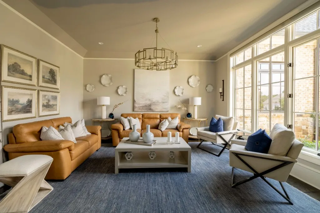 Sugarloaf Residence — sunlit living room with leather seating