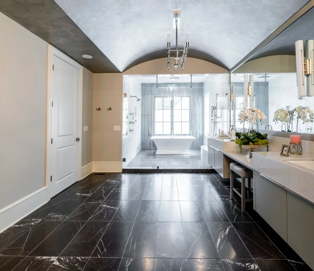 Sugarloaf Residence — primary bath with black marble floors